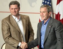 Stephen Harper (left) and George W. Bush