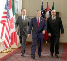 Vicente Fox (left), George Bush (center) and Paul Martin.