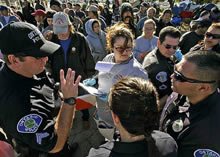 Tent City residents gather as the city of Ontario in the American State of California