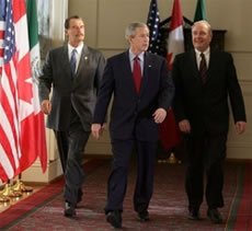 Paul Martin as Prime Minister in Waco, Texas with George Bush and Vicente Fox
