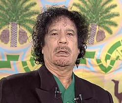 Gaddafi, son buried in desert